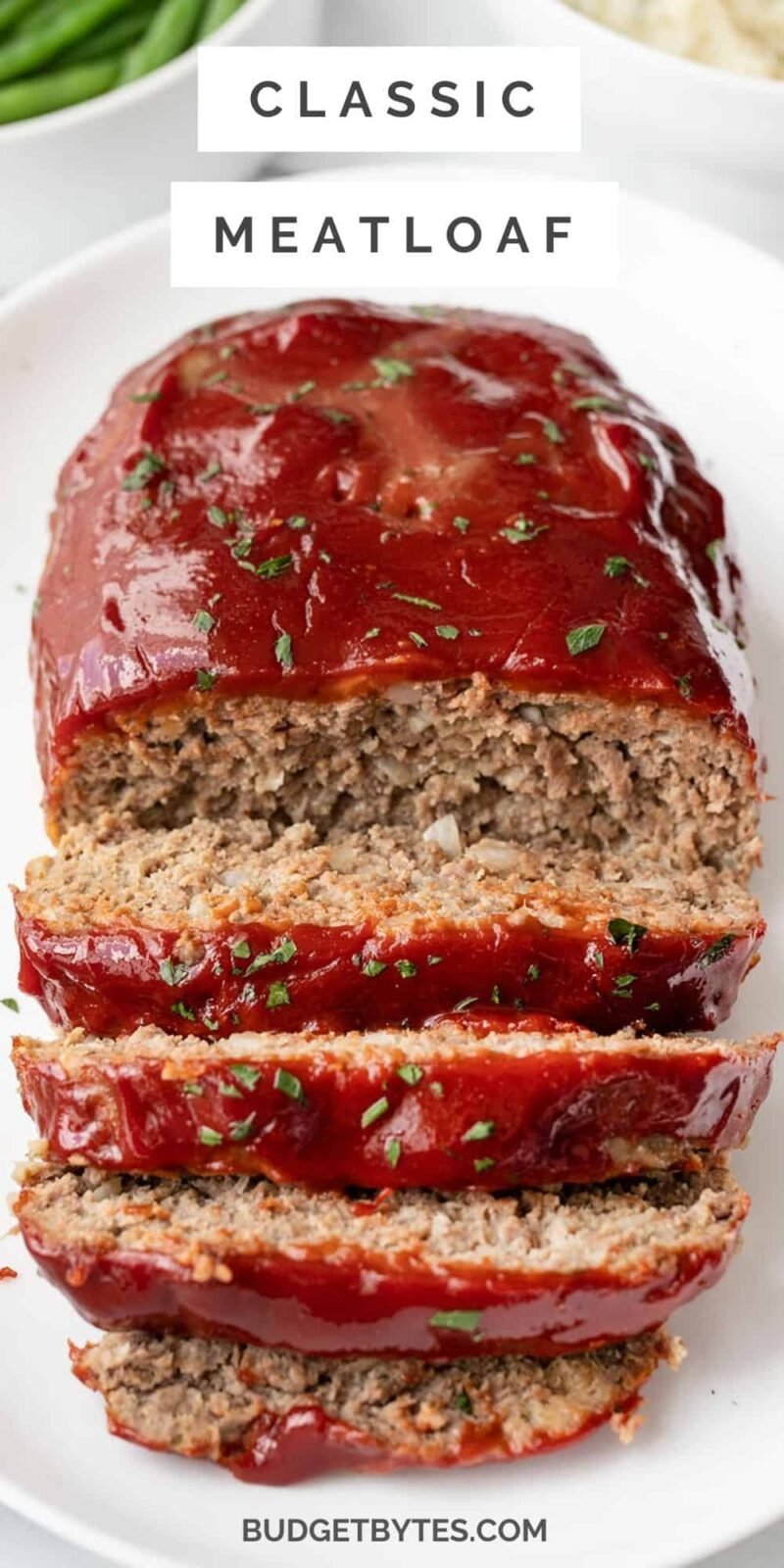 Front view of a sliced meatloaf, title text at the top