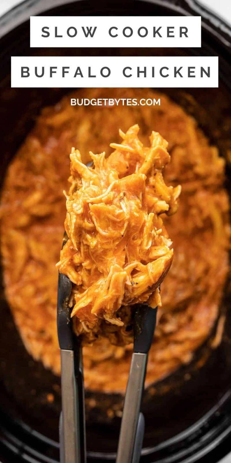 Slow cooker buffalo chicken in tongs over the slow cooker, title text at the top